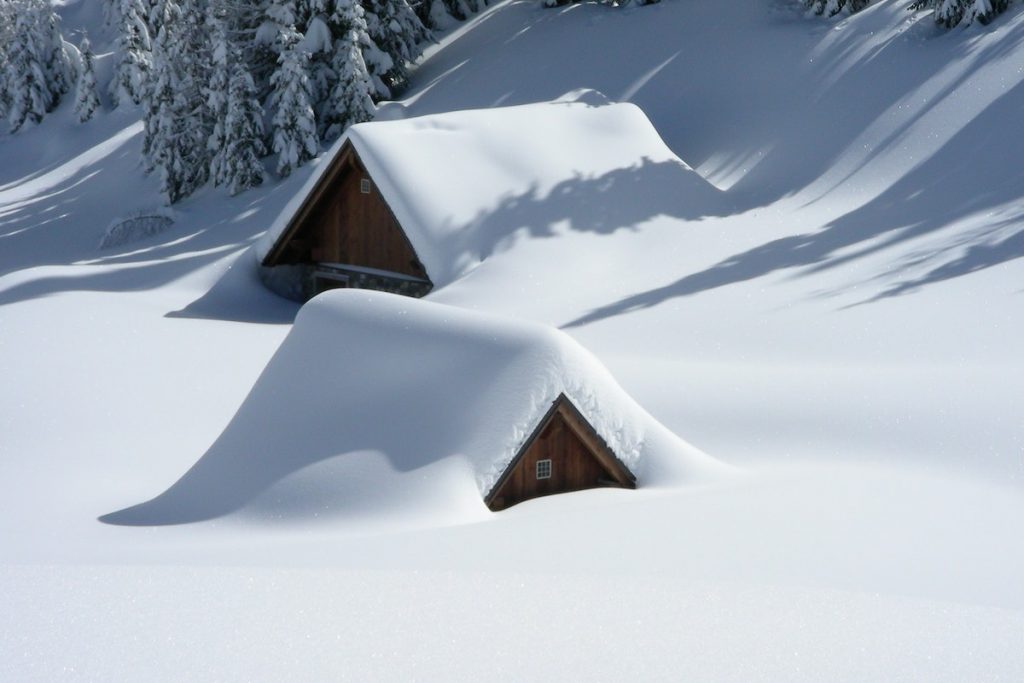 snow laden houses