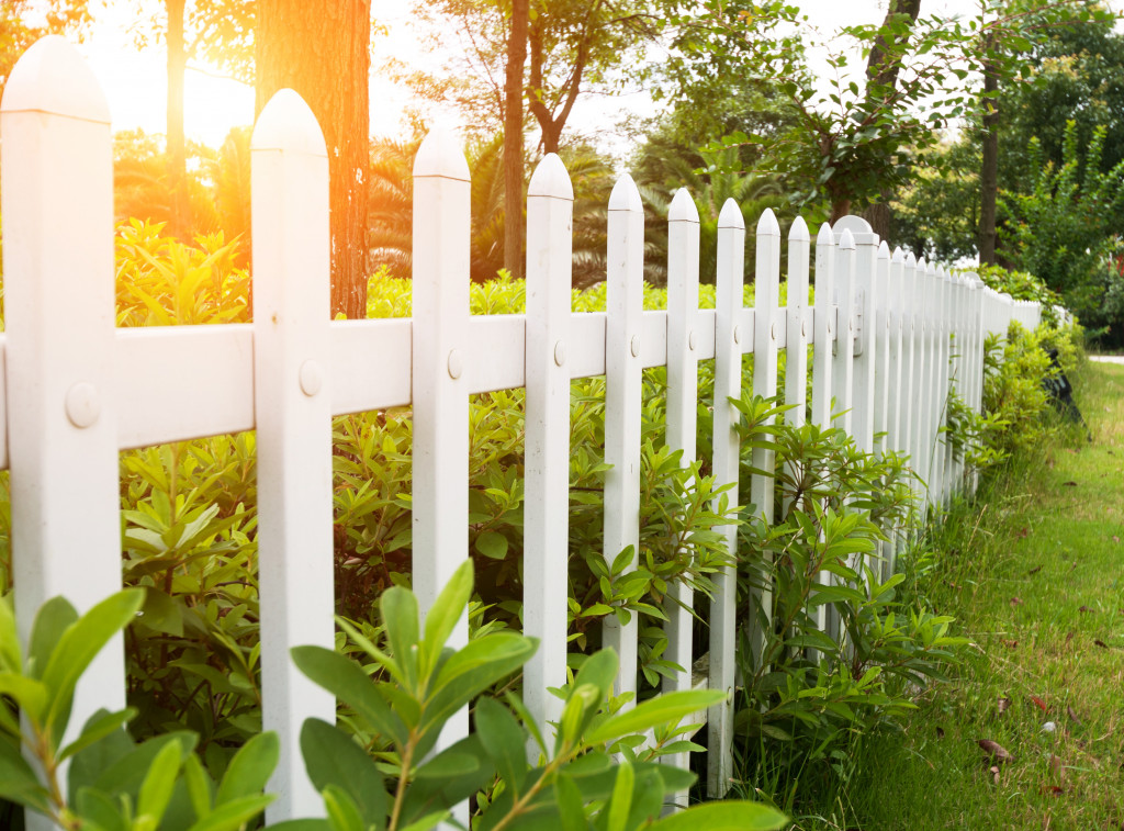 a wooden white picket fence